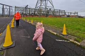 Four-year-old Lucy from Blackpool is all smiles on her pylon tour.