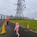 Four-year-old Lucy from Blackpool is all smiles on her pylon tour.