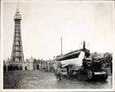 A tractor hauling the Blackpool lifeboat along the front at Blackpool, in front of Blackpool Tower. The crew of the Blackpool lifeboat had just held their quarterly practice launch. (Photo by Hulton Archive/Getty Images)