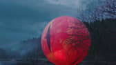 The giant orange 'eye' has appeared is the latest Alton Towers promo for a new ride launch.