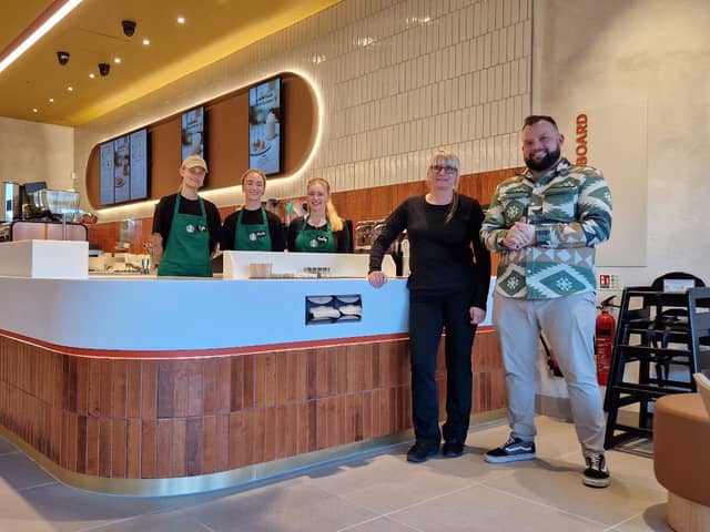Meet the Starbucks family. Kat Jakielska (store manager), Matt Lawson (district manager), and barristas Egle Bidvaite, Phoebe Parr and Emily Gardner.
