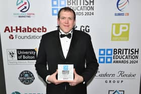 Head of Lancaster University School of Mathematics Pete Tiltman with his British Education Award 