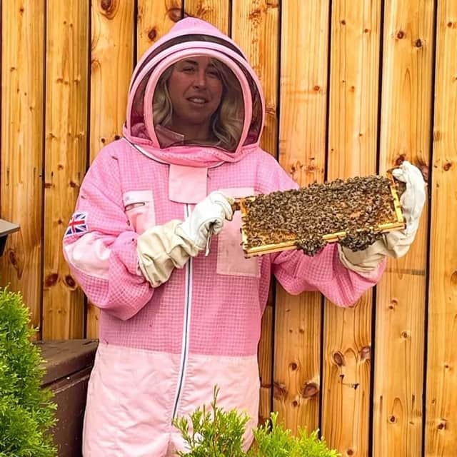 Samantha, of Bramble & Bee, in her pink bee suit