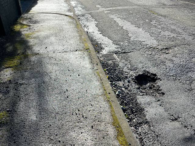 The deep pothole in Rosslyn Avenue hich led to a woman tripping over