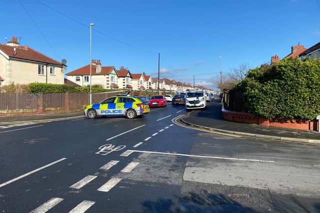 A woman in her 80s was taken to hospital with leg injuries