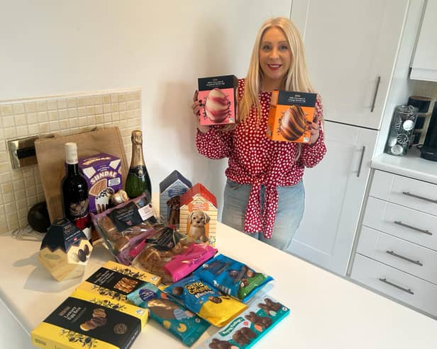 Digital reporter Emma Downey pictured with the Aldi Easter box treats. 