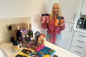 Digital reporter Emma Downey pictured with the Aldi Easter box treats. 