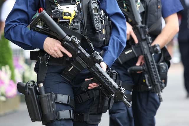 Armed officers raided the home in St Annes and arrested a man and woman, aged in their 40s, on suspicion of drugs and firearms offences
