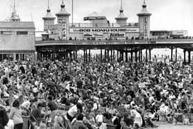 Thousands of beach lovers take to their deck chairs below Central Pier in 1965, when the summer show headliners were Bob Monkhouse, Mike Yarwood and Neville King