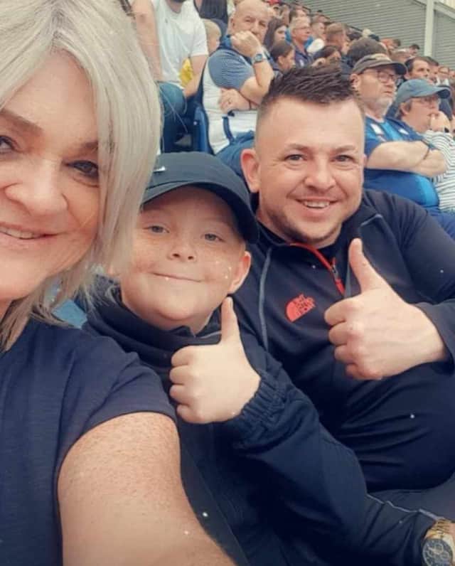 Tommie-lee pictured at Deepdale with his dad and grandmother