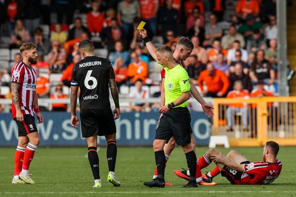 Ollie Norburn is Blackpool's most carded player this season. He won't have to worry about missing any games through suspension now. (Image: CameraSport - Alex Dodd)