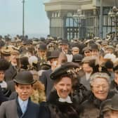 A still image captured from Living History AI Enhanced of Blackpool Pier crowds in 1903