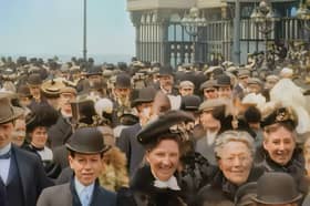 A still image captured from Living History AI Enhanced of Blackpool Pier crowds in 1903