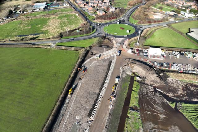 New aerial photos show the final stages of construction of the M55 to Heyhouses Link Road are well advanced, but prolonged wet weather has hampered progress and it is now scheduled to open in June 2024