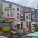 The empty Shazron Guesthouse on Havelock Street, Blackpool, woth firefighters still in attendance.