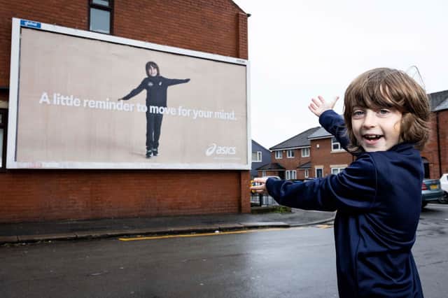 Henry, featured in a local billboard located in Leigh.