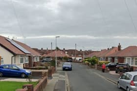 Two masked men wearing black forced their way into a property on Annan Crescent in Blackpool (Credit: Lancashire Police)