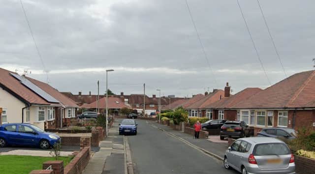 Two masked men wearing black forced their way into a property on Annan Crescent in Blackpool (Credit: Lancashire Police)