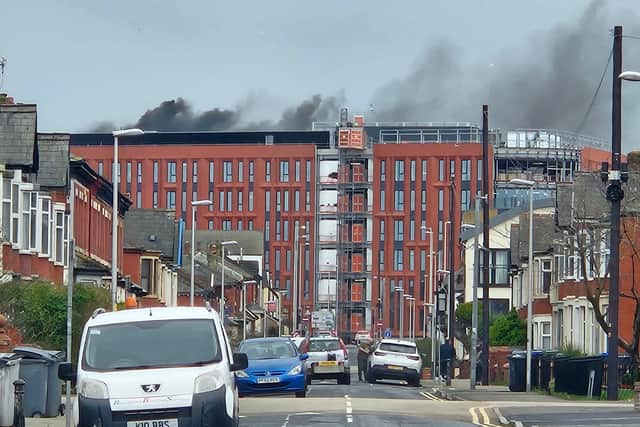 The fire started on the roof of the seven-storey building (Credit: Tanya Leeming)