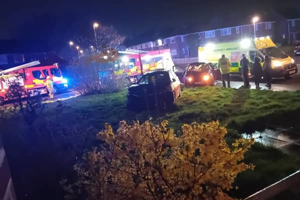 The scene as fire crews rescued casualties from the wreck in Draycot Avenue, Grange Park last night