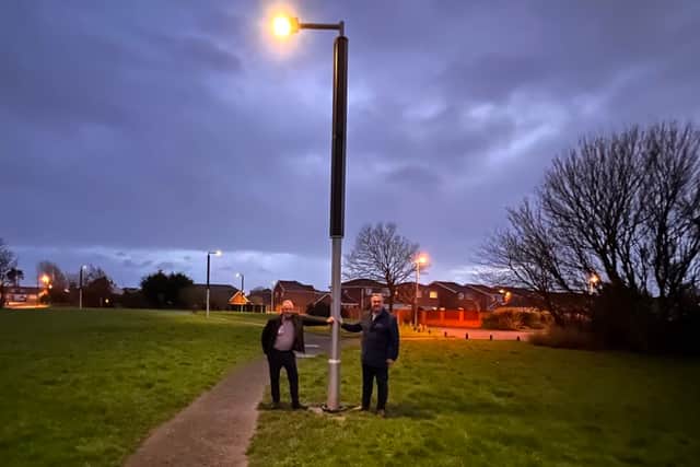 Councillors Baker and Roberts with the new solar lighting