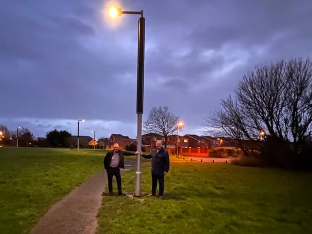 Councillors Baker and Roberts with the new solar lighting