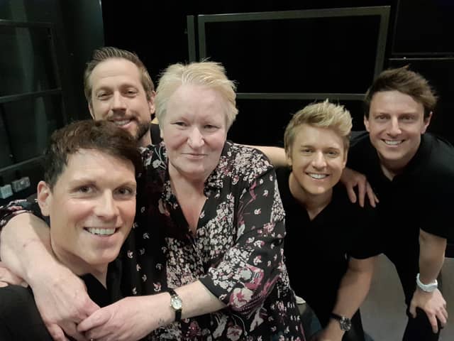 Christine Martin from Blackpool pictured with G4 members (L to R) Mike Christie, Duncan Sandilands, Jonathan Ansell and Lewis Raines (who has since been replaced by Jai McDowall).