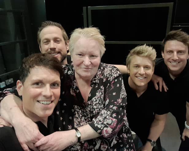 Christine Martin from Blackpool pictured with G4 members (L to R) Mike Christie, Duncan Sandilands, Jonathan Ansell and Lewis Raines (who has since been replaced by Jai McDowall).