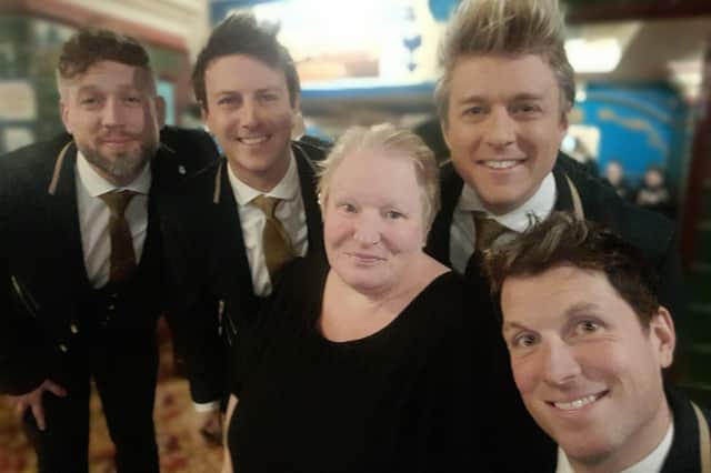 Christine Martin from Blackpool pictured with G4 members (L to R) Lewis Raines (who has since been replaced by Jai McDowall), Duncan Sandilands, Jonathan Ansell and Mike Christie.
