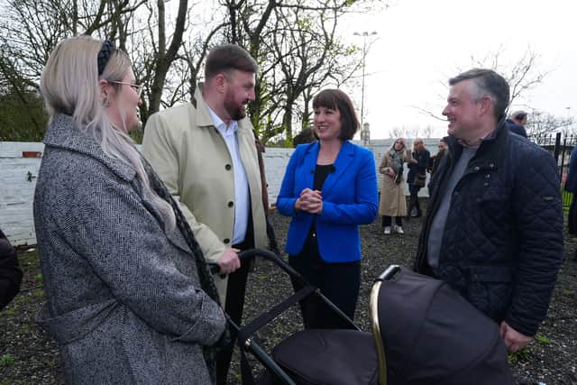 Shadow chancellor Rachel Reeves and shadow paymaster general Jonathan Ashworth greet Chris Webb during their campaign in Blackpool (Credit: Peter Byrne/PA Wire)
