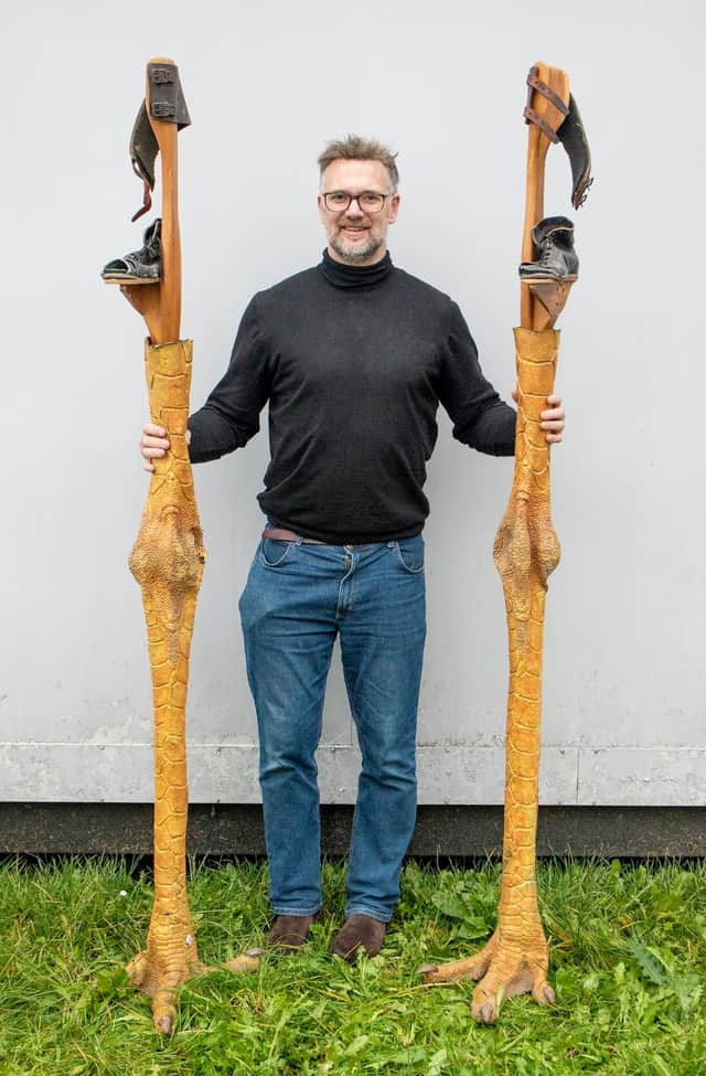 Charles Hanson with chicken leg stilts used in Star Wars (Credit: Hansons / SWNS)