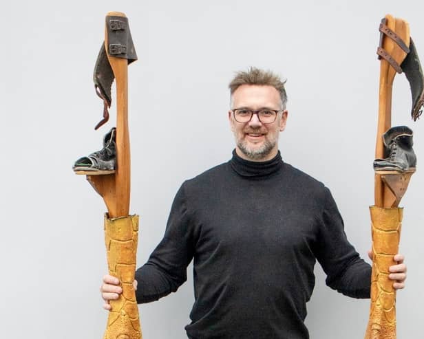 Charles Hanson with chicken leg stilts used in Star Wars (Credit: Hansons / SWNS)