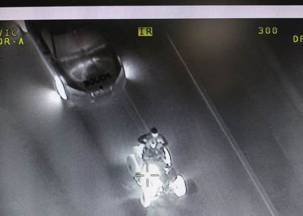 The police helicopter used its night vision camera to track the quad bike rider as he tried to escape from officers 