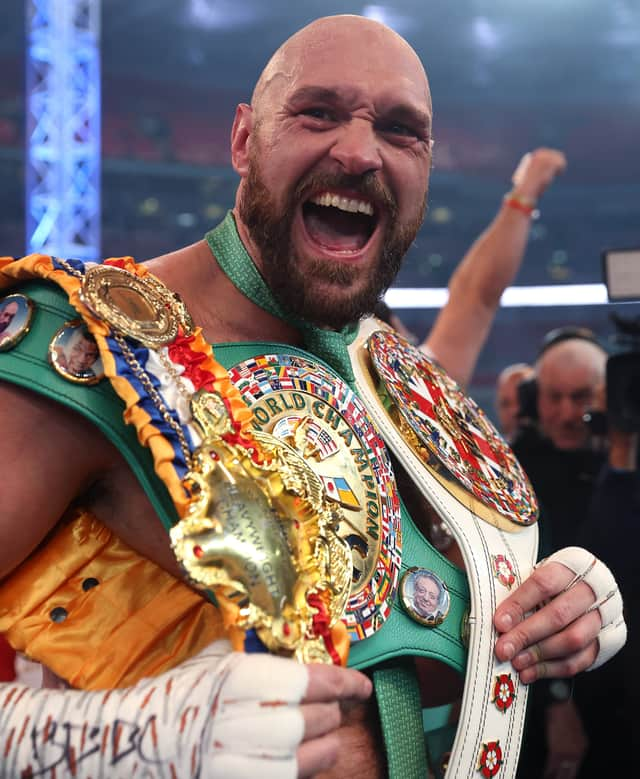 Tyson Fury celebrates victory after the WBC World Heavyweight Title Fight between Tyson Fury and Dillian Whyte at Wembley Stadium on April 23, 2022 in London, England