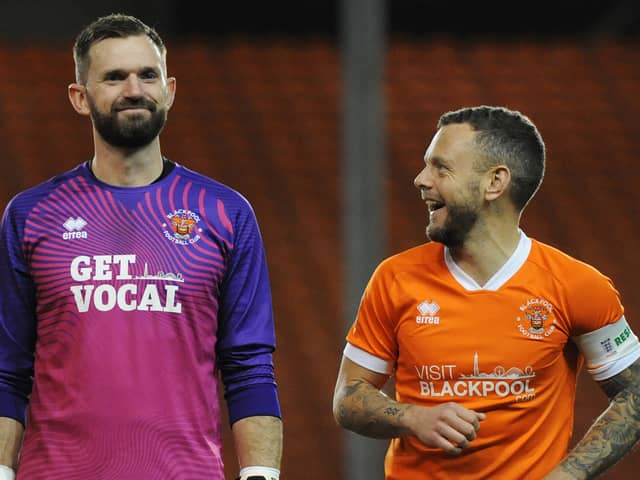 Mark Howard (L) won promotion to the Sky Bet League One at the weekend. He along with Elliot Lee (not pictured) play for Wrexham. 
