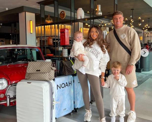 Charlotte Dawson with fiance Matthew Sarsfield and their two sons, Noah and Jude, at Heathrow Airport.
