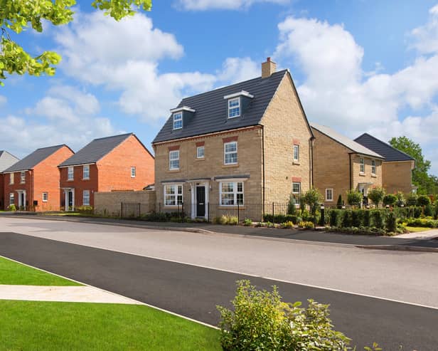 A typical street scene at David Wilson Homes' Centurion Village in Leyland.