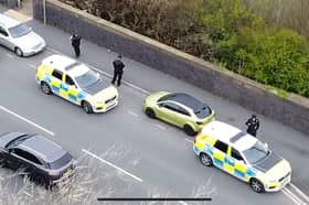 Armed police on Waterloo Road Bridge, Blackpool responding to reports of man on loose with handgun -Picture and video credit Dan Mark
