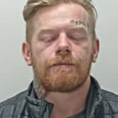 Liam Cowley is wanted in connection with numerous offences (Credit: Lancashire Police)