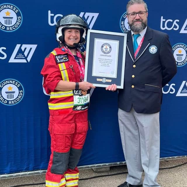 After months of training, Caroline crossed the finish line on The Mall in London and was presented with her Guinness World Record certificate and medal.