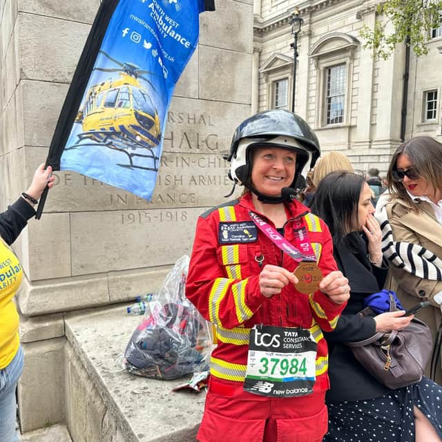 Caroline Duncan from Clitheroe took on the 26.2 miles along with thousands of others on Sunday which she tackled in her full flight suit.