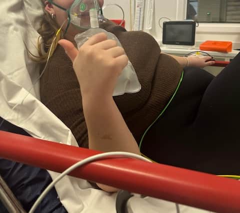 Rebecca Salisbury on her way to hospital after dislocating her ankle