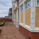 The boarded-up windows at the house on Bispham prom following the targeted vandal spree.