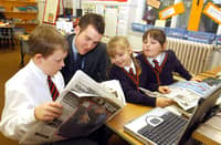 Former Gazette reporter Andy Sykes talks to children at Waterloo Primary School in Blackpool about life working at a newspaper. L-R are Sophie Fletcher (9), Rachel Clarke (9) and Ryan Clarkin (8)
