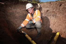 A Cadent worker replacing a gas main