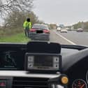 A 60-year-old driver was caught by police officers about to smoke heroin on the hard shoulder of the M62.