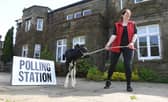 Suzy Ferrari-Topping re-moo-ving a neighbours calf from the polling station at Ferrari's Country House, Thornley, near Longridge.