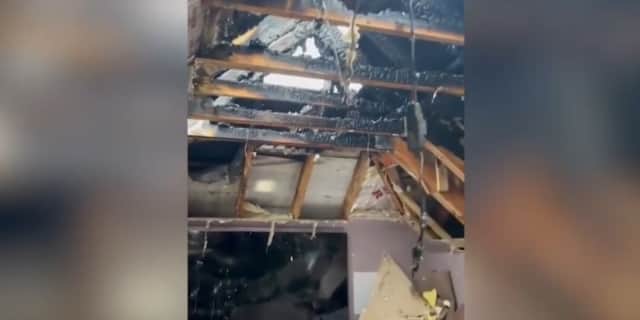 Watch: Fire started from suspected lighting strike damages home