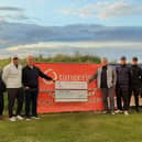 The group behind the annual St George’s Charity Golf Day present some of the money raised to one of their chosen charities – Trinity Hospice and Brian House Children’s
Hospice