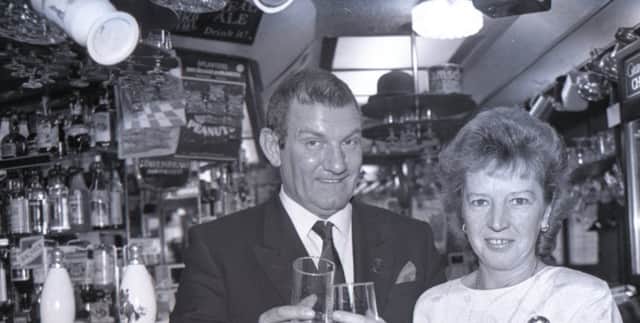 Inkeeper of the year Albert Caffery, licensee of the Ramsden Arms Hotel, Talbot Road, was presented with a silver plated commemorative plaque, a cheque for £150 and a complementary keg of Guinness. Albert is pictured above with his wife Christine